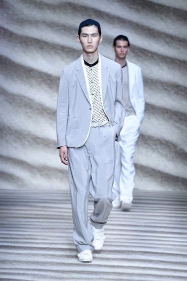 MILAN, ITALY - JUNE 20: A model walks the runway during the Giorgio Armani Ready to Wear Spring/Summ...